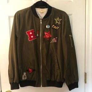 Green Bomber Jacket with Patches and Pins